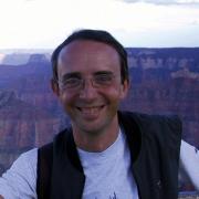 è professore ordinario al Politecnico di Torino e insegna “Impatto Ambientale dei Sistemi Energetici”. La formazione di ingegnere nucleare lo ha portato ad occuparsi, come argomenti di ricerca, di fusione termonucleare controllata, smantellamento degli impianti, effetti delle radiazioni sull’uomo e sull’ambiente, inquinamento ambientale. è autore su questi argomenti di oltre 60 articoli su riviste internazionali del settore. è membro del “Comitato Scienziate e Scienziati contro la guerra” (www.scienzaepace.it) e ha contribuito a organizzare due convegni a Torino (2000 e 2001) sul tema “Scienziati contro la guerra”. Per Odradek ha curato nel 2000 il volume “Contro le nuove guerre”, per Jacabook nel 2003 il volume “Guerra Infinita, Guerra Ecologica. I danni all’uomo e all’ambiente delle nuove guerre”.